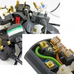 Image shows a pile of electrical plugs